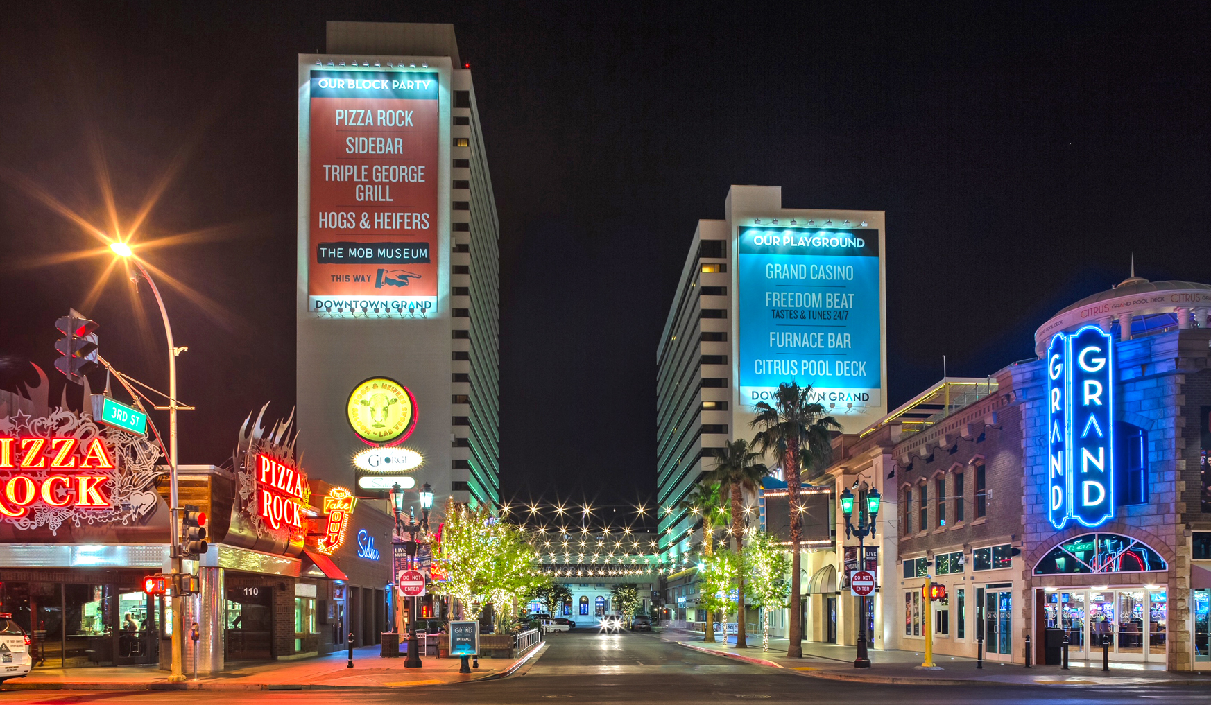 Downtown Grand Hotel & Casino illuminated at night